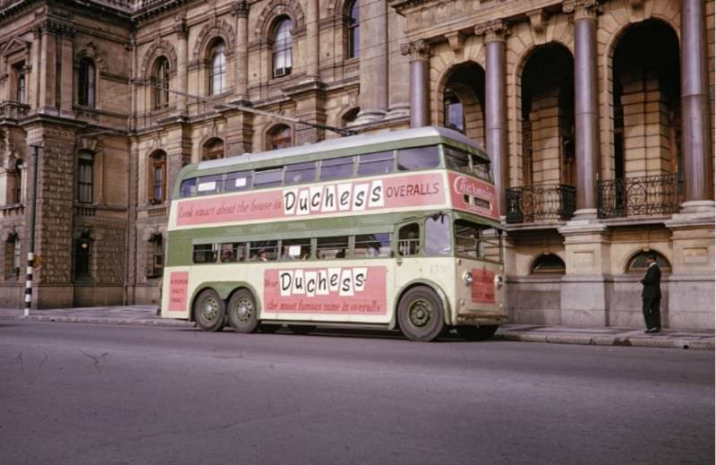 Double-decker bus on street, 1960s