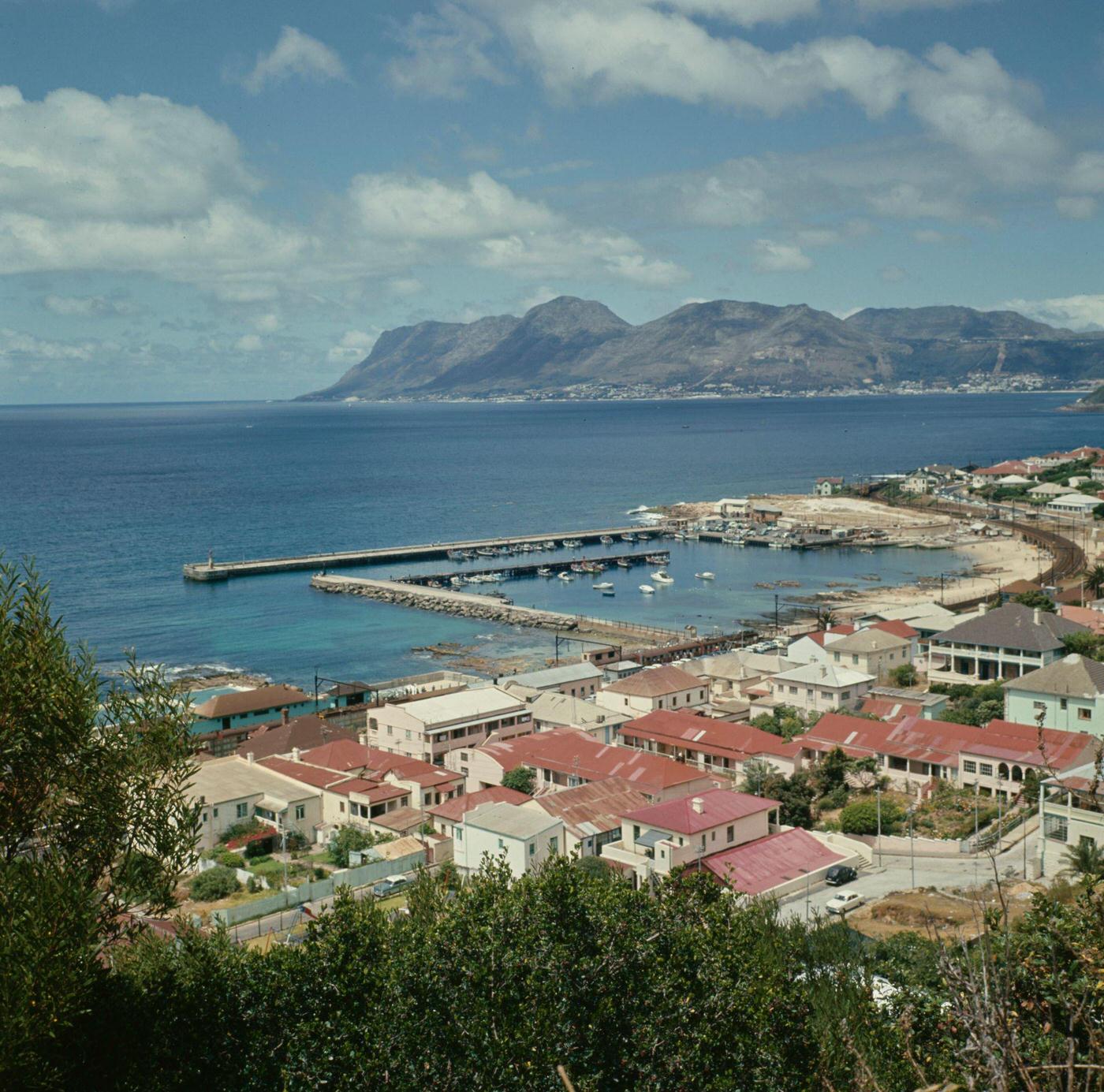 Boats moored in the harbor of the fishing village of Kalk Bay on the coast of False Bay near Cape Town, 1966