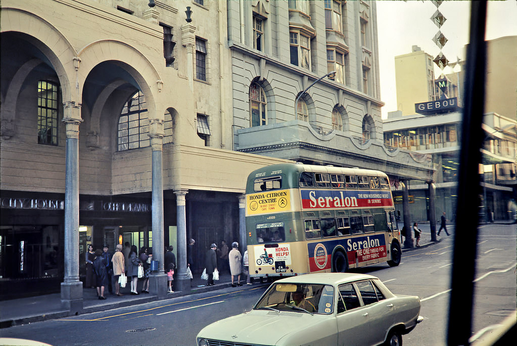Strand street, 1974. On the left, Electricity House where the Cape Sun Hotel is now.