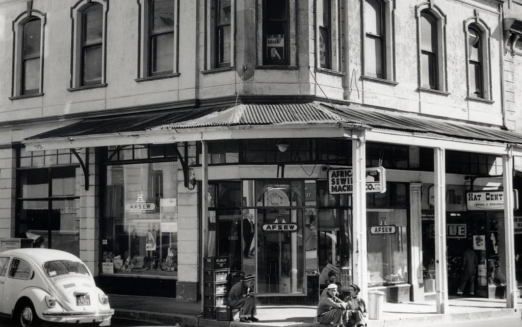 The Plein street area. The Hat Centre is having a sale, 1971