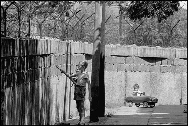 Children playing at the Berlin Wall in Berlin Wedding.