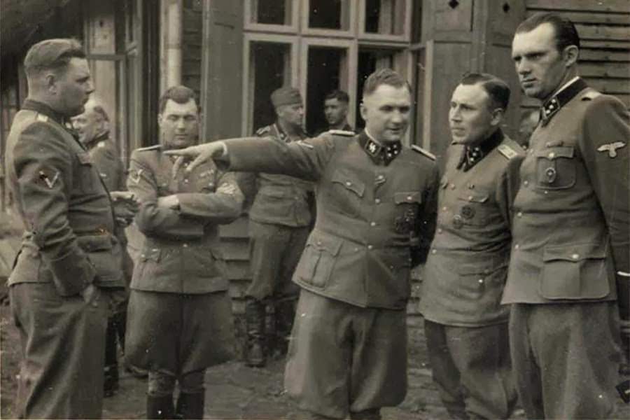 A group photo of the mass murderers of Auschwitz: Josef Kramer, Josef Mengele, Richard Baer, Karl Höcker
