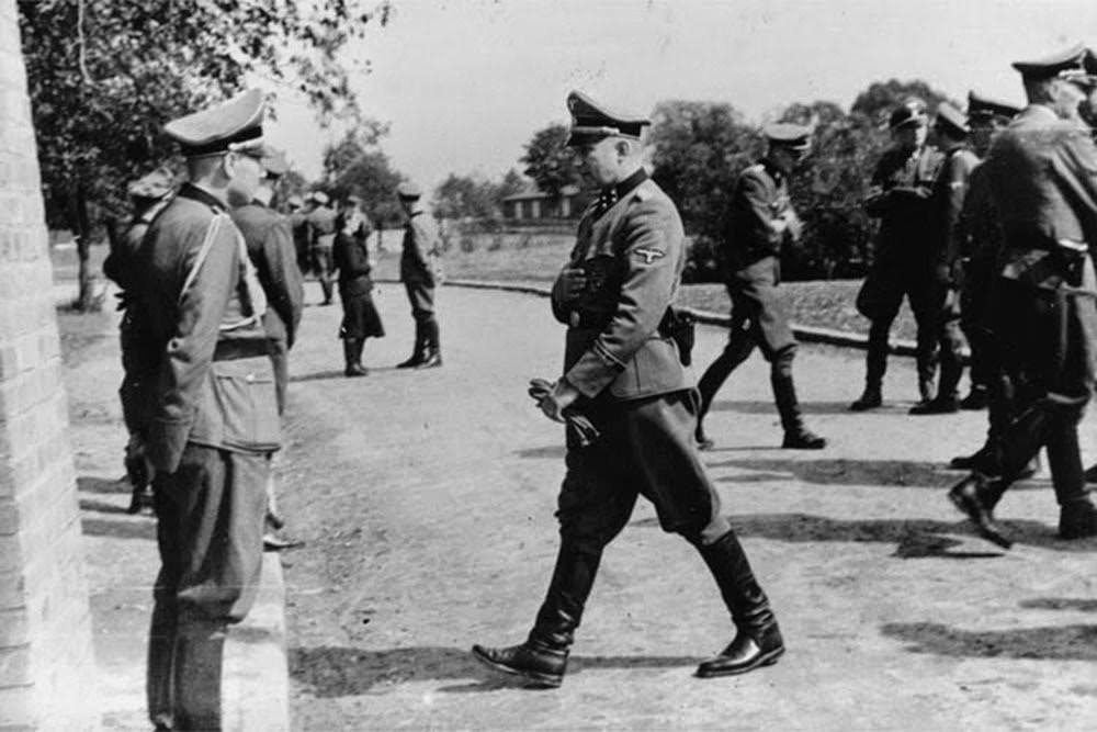 SS officers gather for the dedication ceremonies of the new SS hospital.