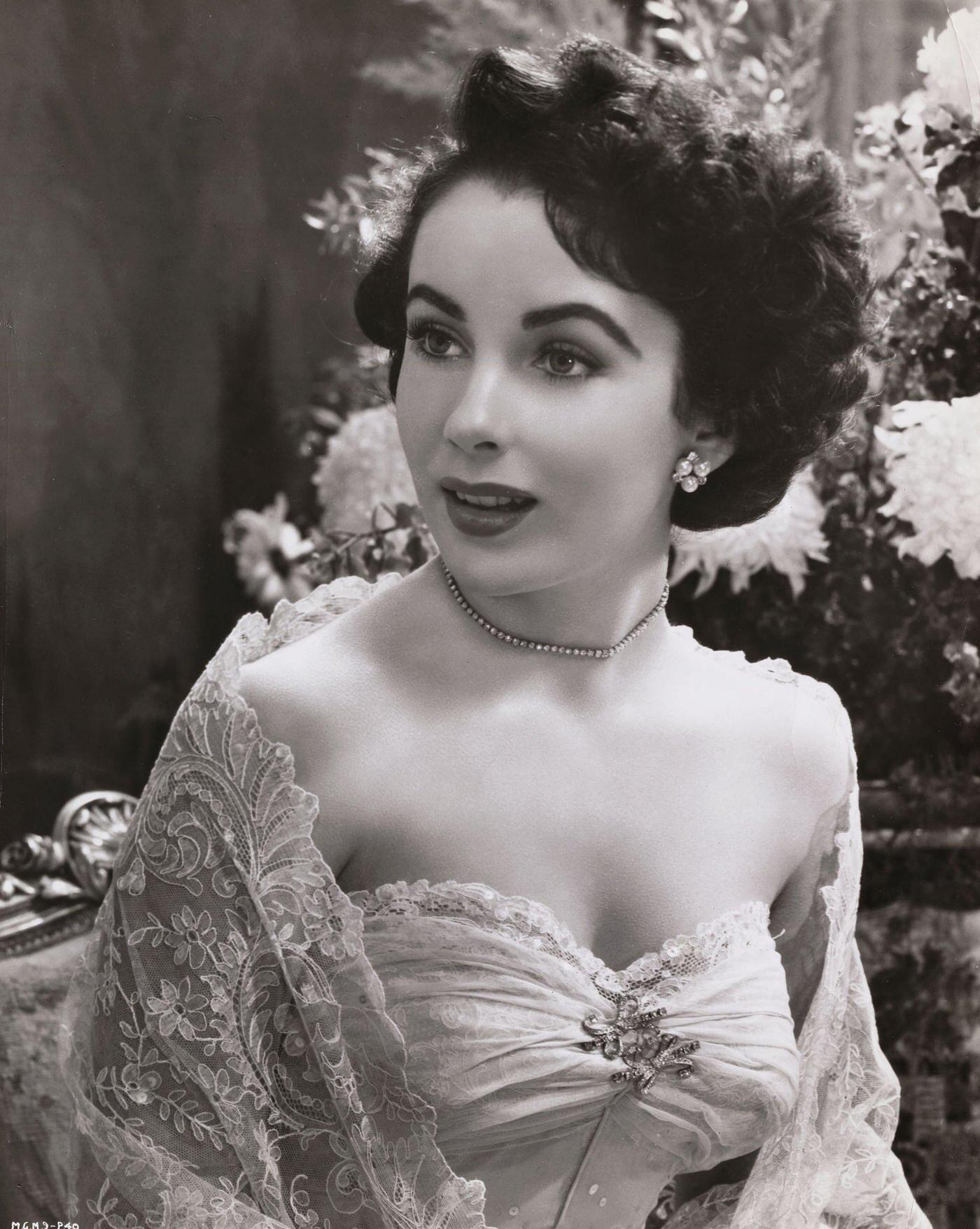 Elizabeth Taylor in the role of Robert Taylor's wife in the film 'Conspirator', her most mature part to date, directed by Victor Saville, 1949.