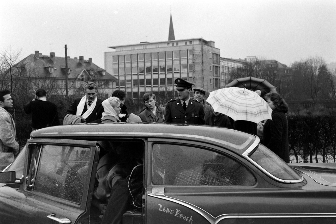 Sgt. Elvis Presley leaves the house he and his family occupied in Bad Nauheim, Germany, March 1960.