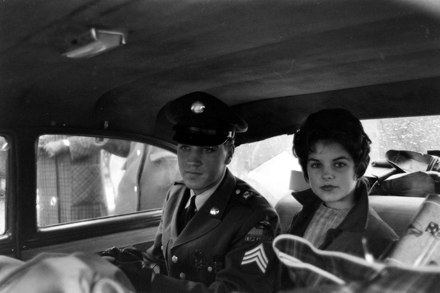 Elvis and Priscilla leave the house he and his family occupied in Bad Nauheim, Germany, March 1960.