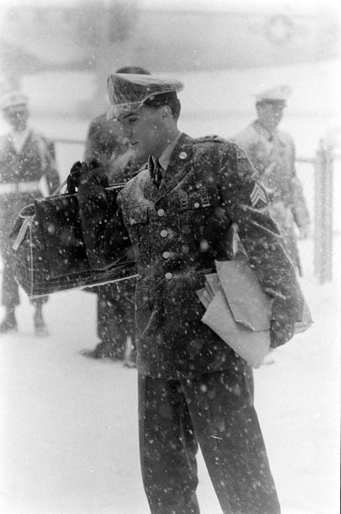 Elvis Presley arrives at McGuire Air Force Base, New Jersey, March 1960.