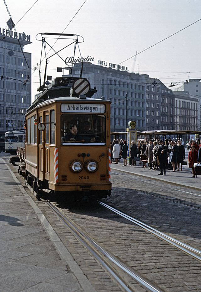 Frankfurt 4-wheel Arbeitswagen (works tram) 2040 passing the tram stops in front of Frankfurt Hauptbahnhof. This is a former V series tram (Düwag, Siemens/1910) of which only eight were built, 1967