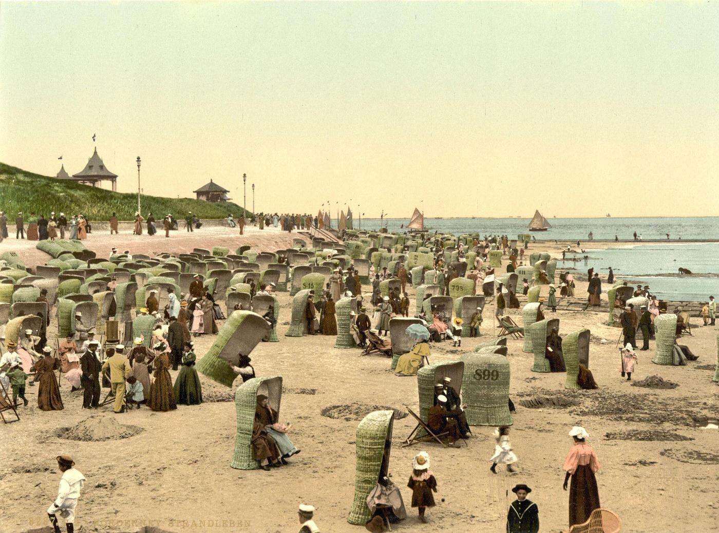 Beach scene in Norderney, Germany, late 19th century.