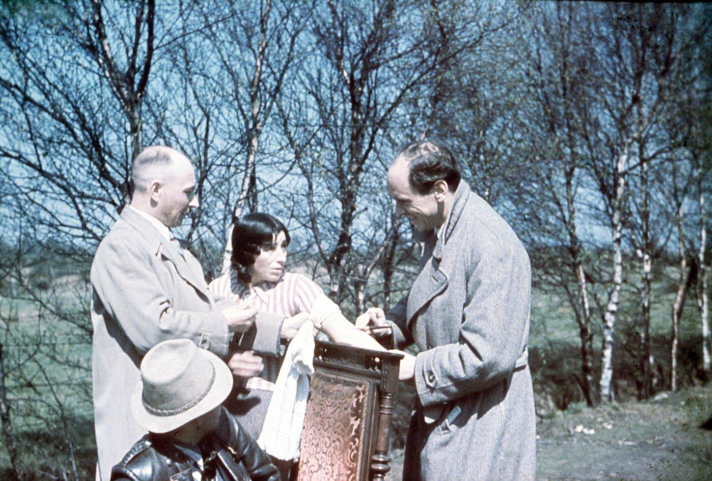 Dr. Robert Ritter, head of the Racial Hygiene Research Center, taking a blood sample as part of research during the Gypsy (Sinti and Roma) deportation in 1938.