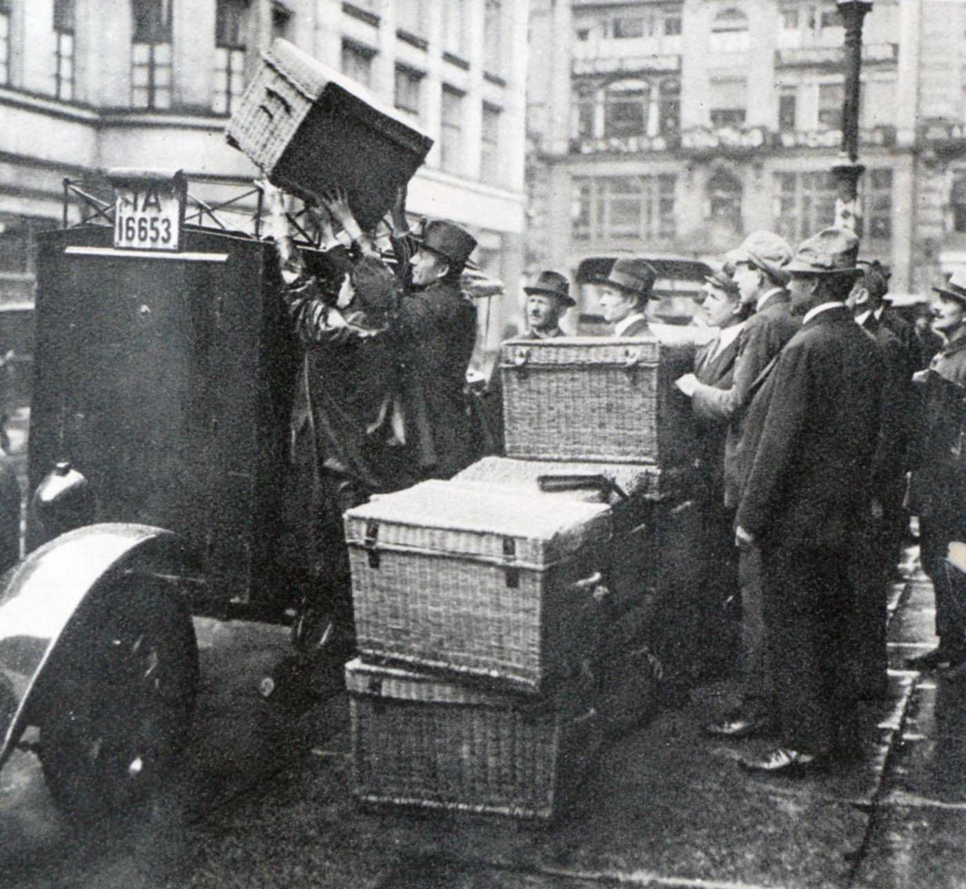 Basket loads of money loaded on a vehicle during Weimar German hyperinflation, 1923.