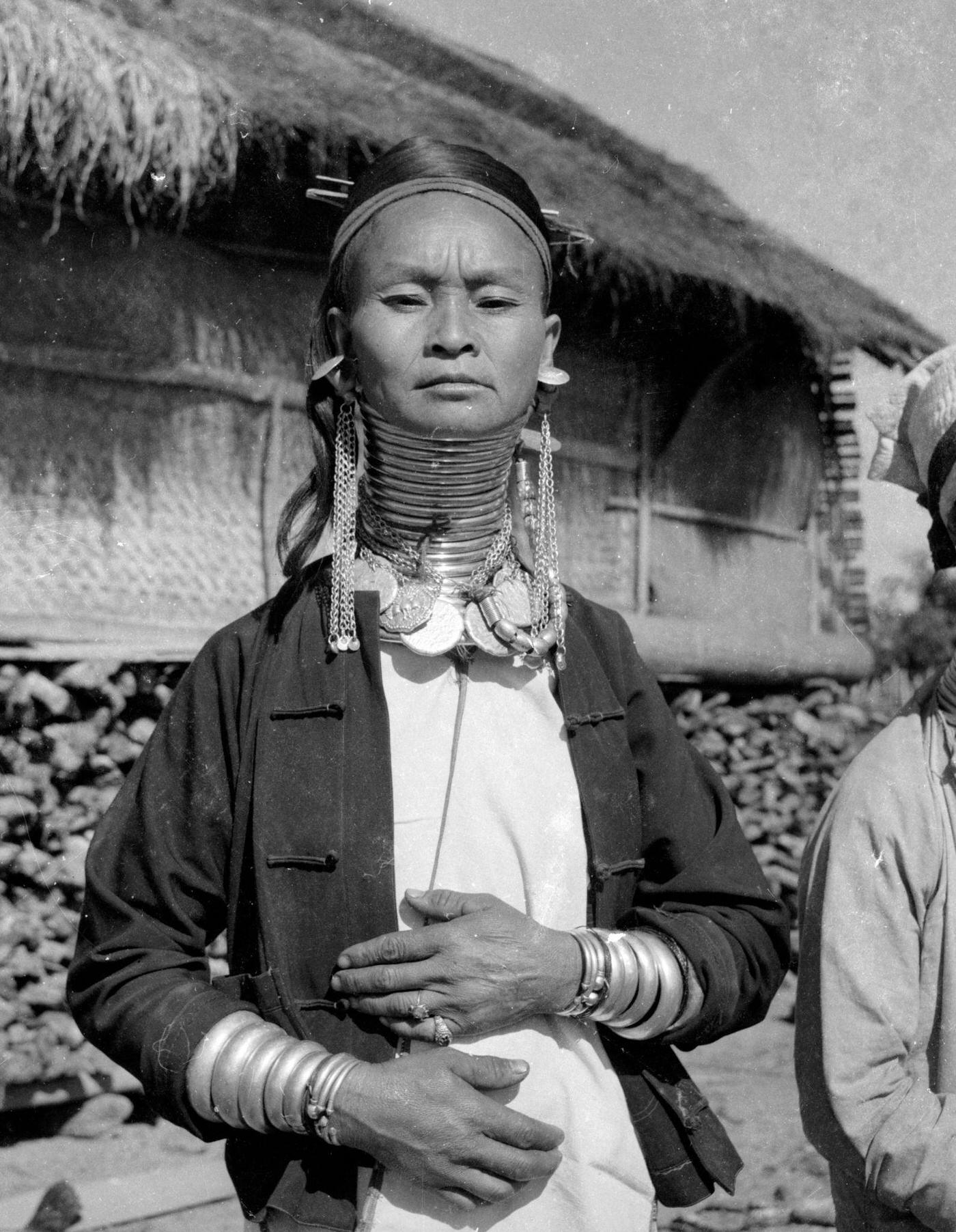 Padaung tribe member wearing brass rings to lengthen her neck, Myanmar, November 1964.