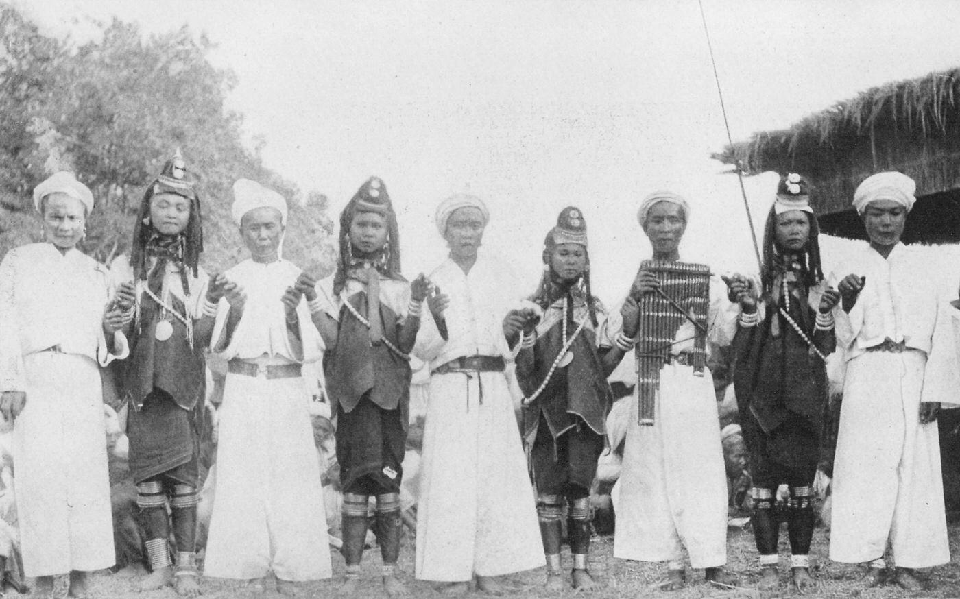 Tribe members performing a Padaung dance in traditional clothing, Myanmar, 1922.