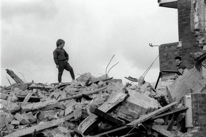 Boys on rubble, 1980s