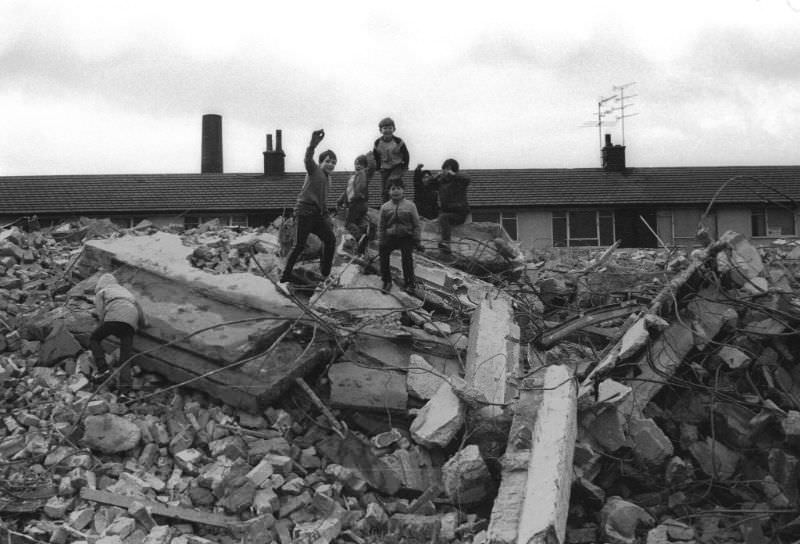 Six boys on rubble, 1980s