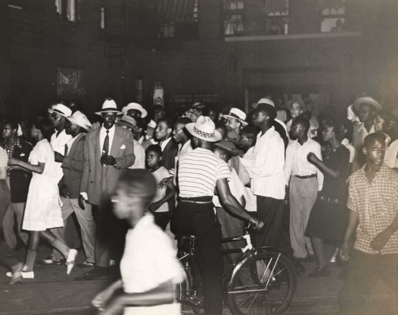 Crowded streets in Harlem, 1943.