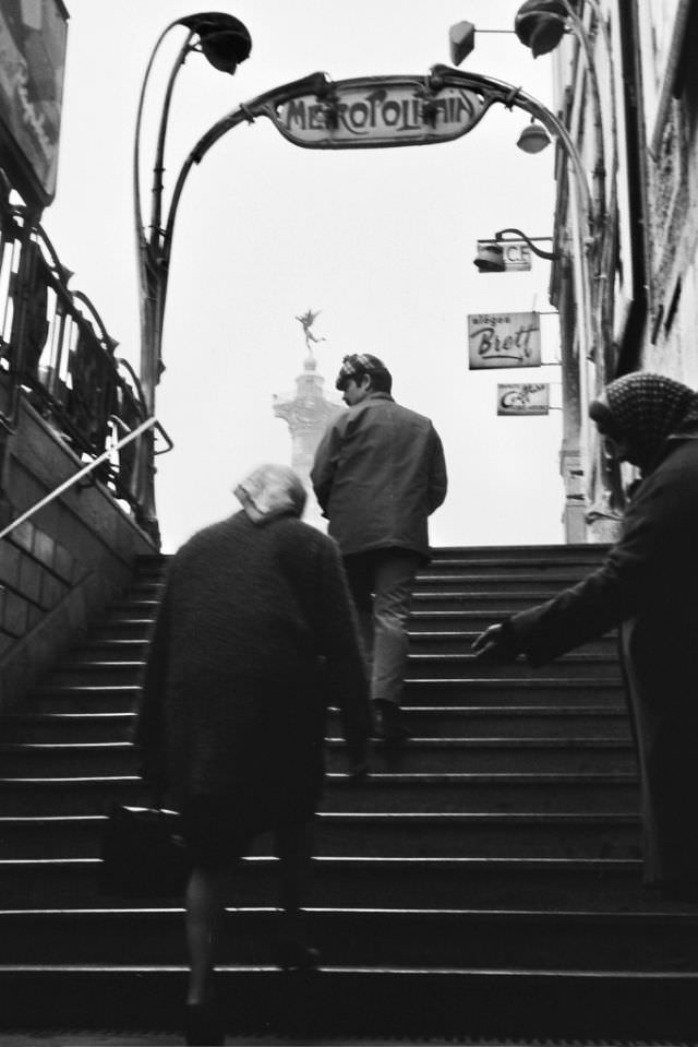 Up the stairs from the Metro to Gare de la Bastille, soon to be closed, Paris, December 1969