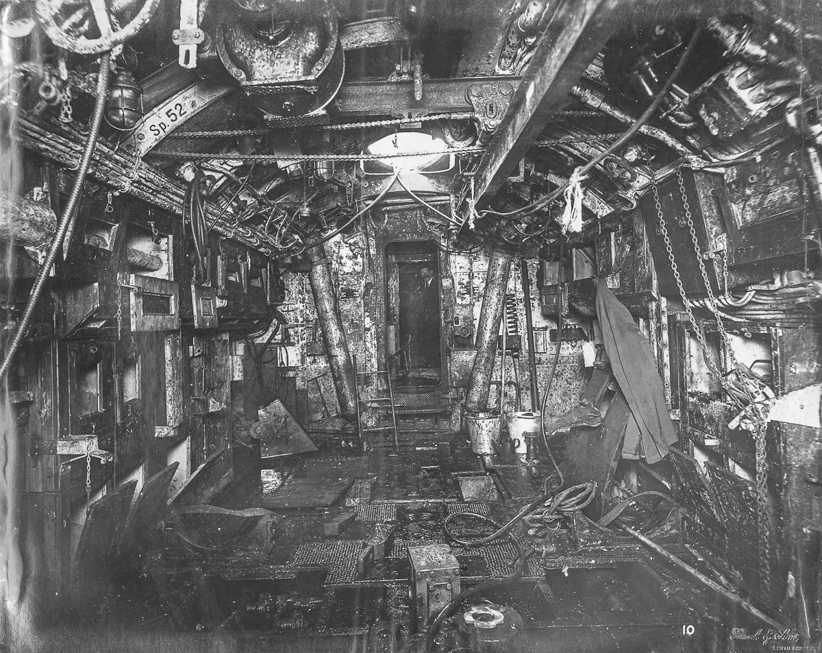 Torpedo room looking aft. The beam for lifting torpedoes into place is overhead.
