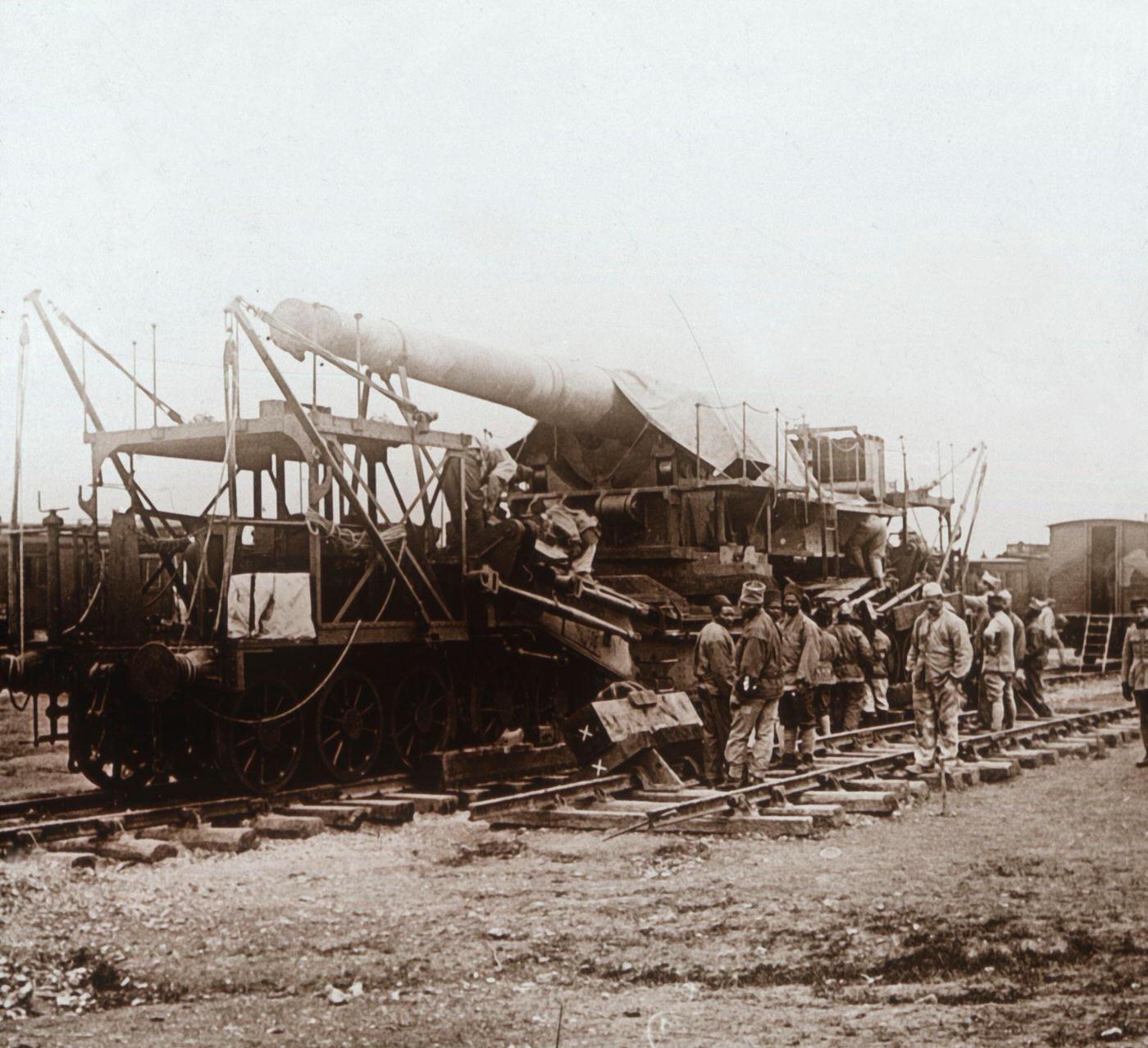 African troops and heavy artillery mounted on a train in Champagne, northern France, 1914-1918.