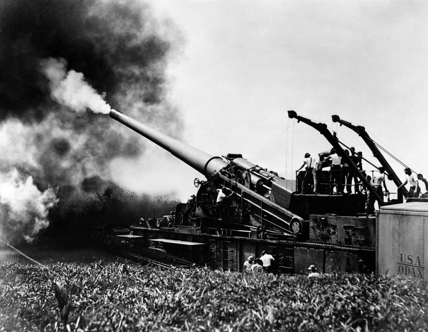 Big artillery railroad gun firing during World War II in the 1940s.