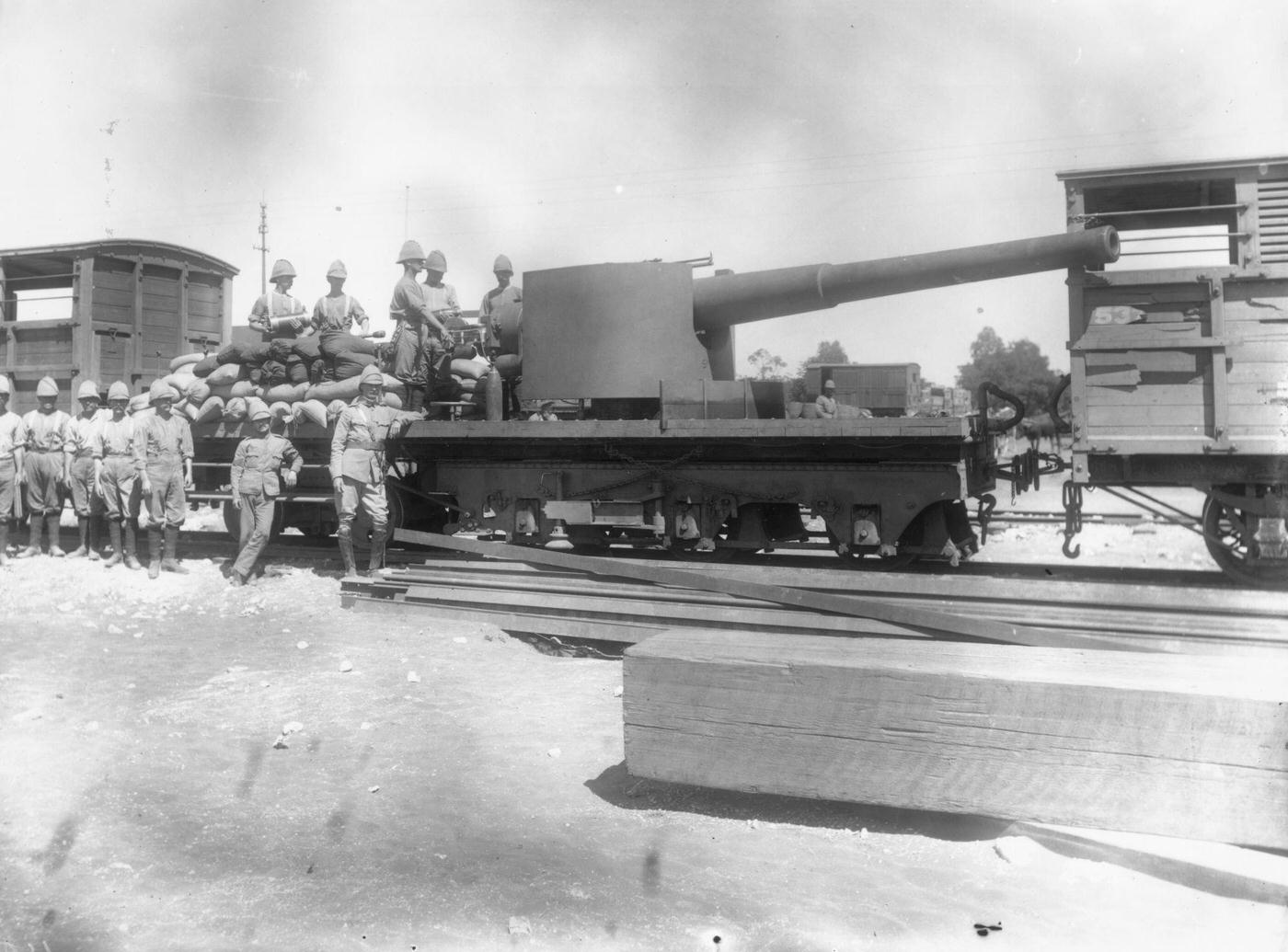 British six-inch naval gun mounted on a railway truck for transportation to Modder River Station, 1900.