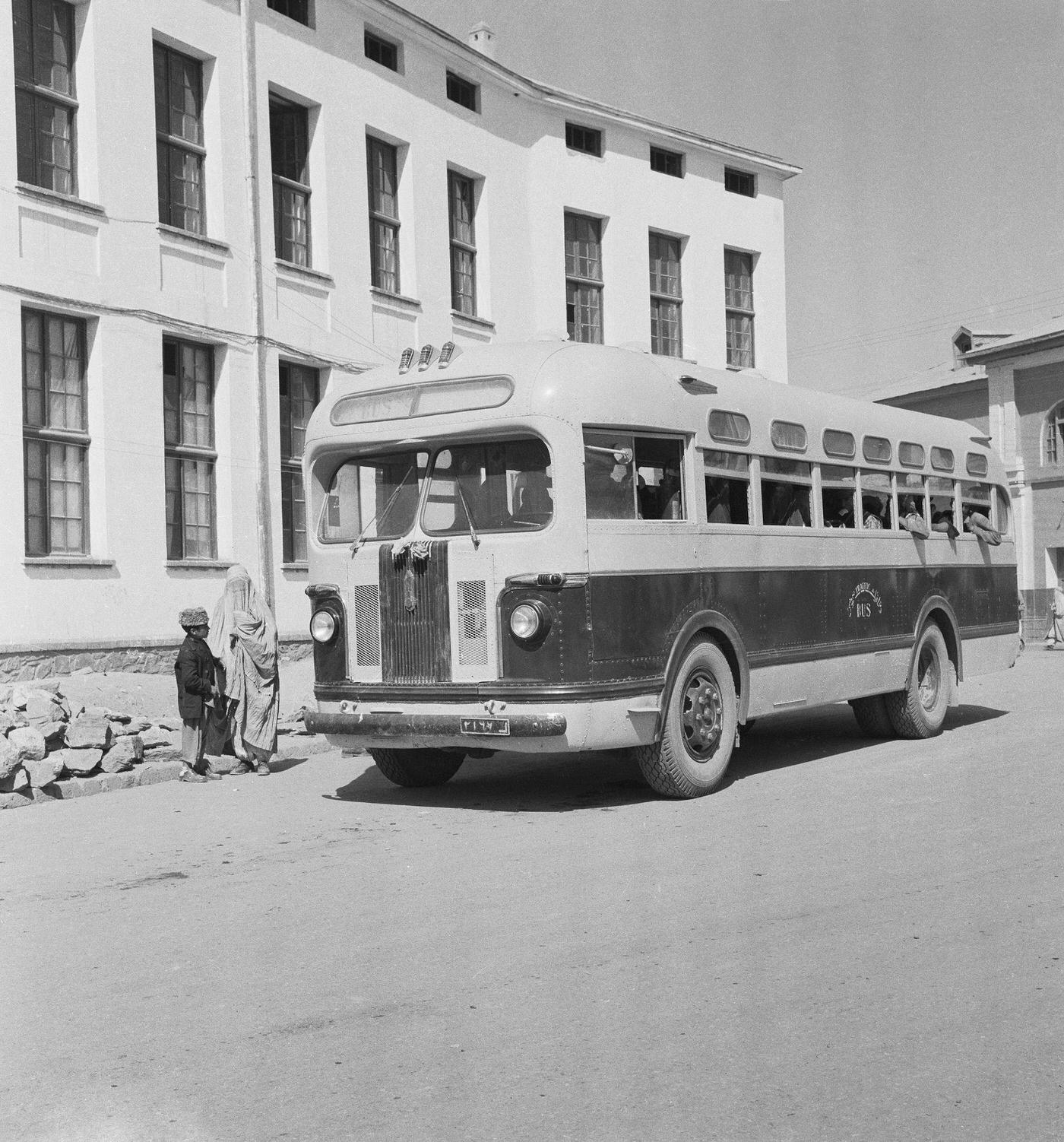 Bus parked on a Kabul street, Afghanistan.