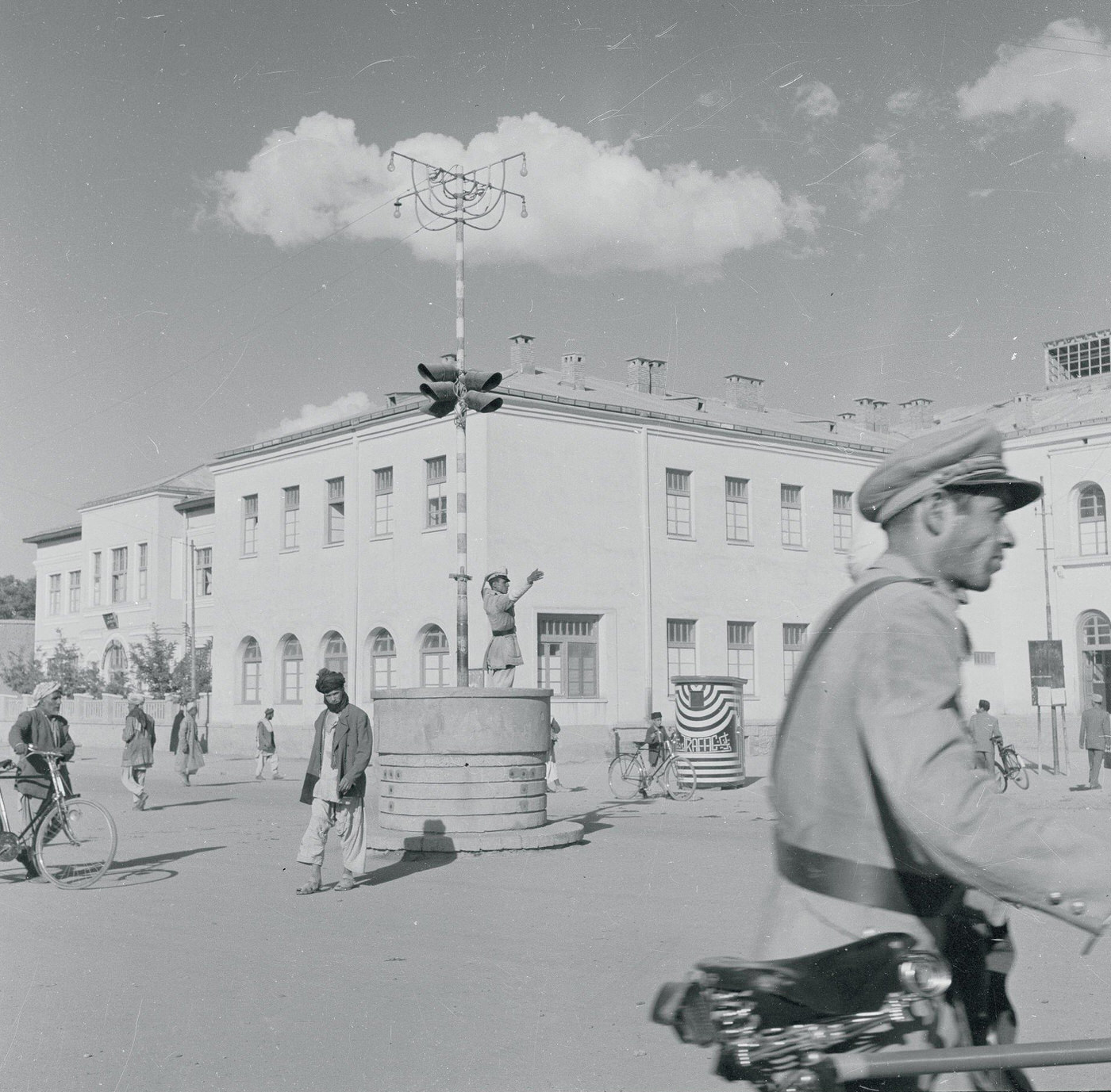 Policeman directing traffic in Kabul, Afghanistan.