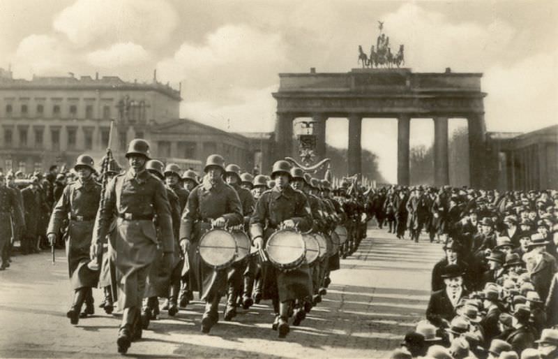 Brandenburg Gate with a guards parade, Berlin, 1930