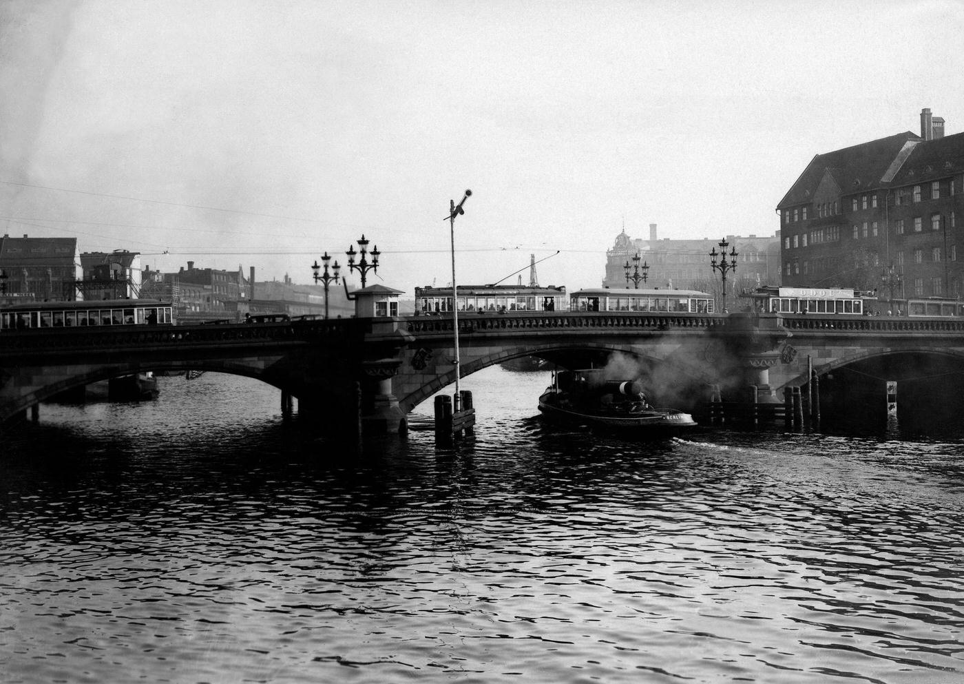 Germany Berlin: Traffic on the Jannowitzbruecke: tram, pedestrians and cars are crossing the Spree, Berlin, 1952