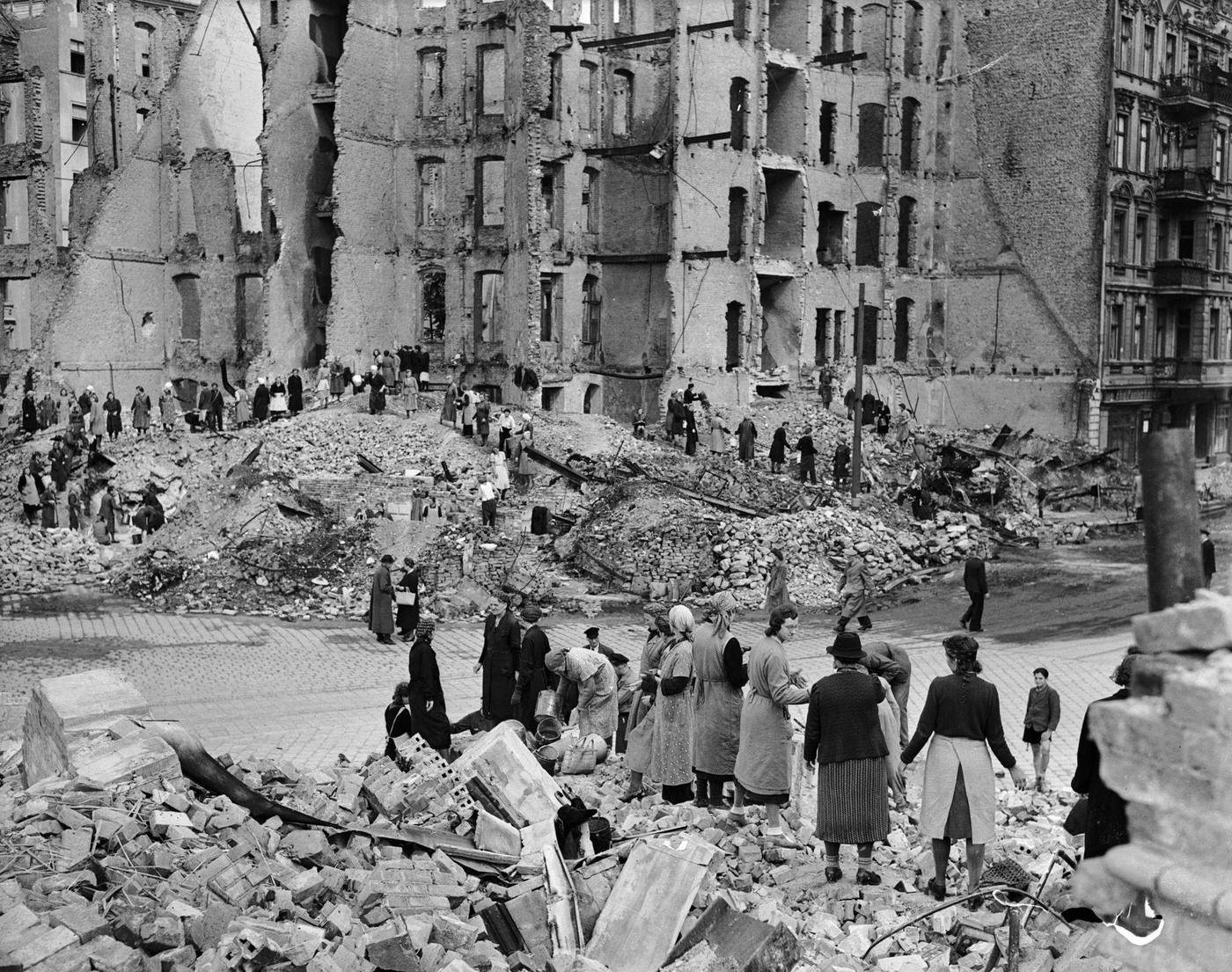 Berlin women work in a 'chain gang' to clear rubble in the war-torn city.