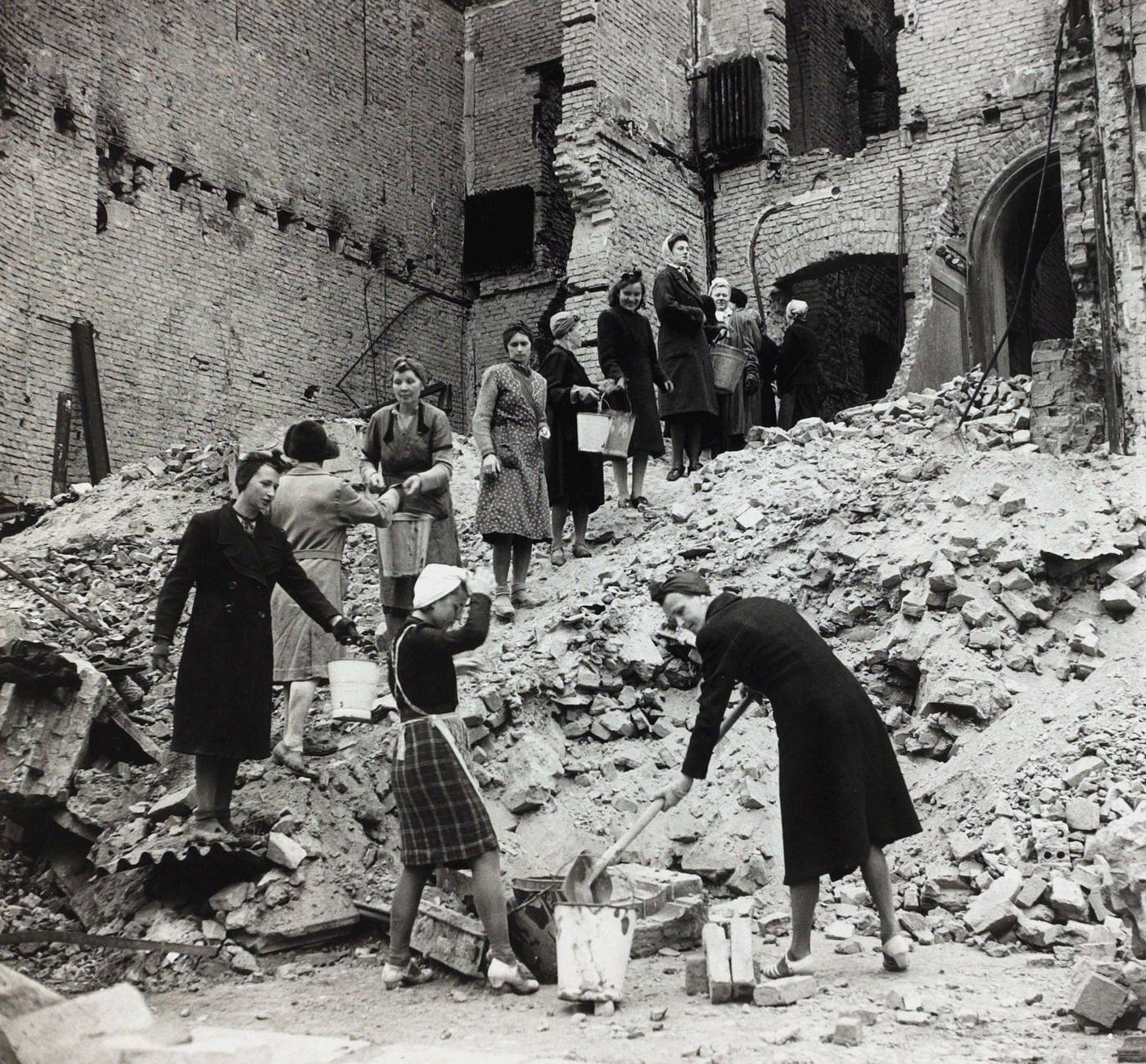 German women clearing up debris and rubble during the cleanup in Berlin after the devastation of World War Two, 1945.