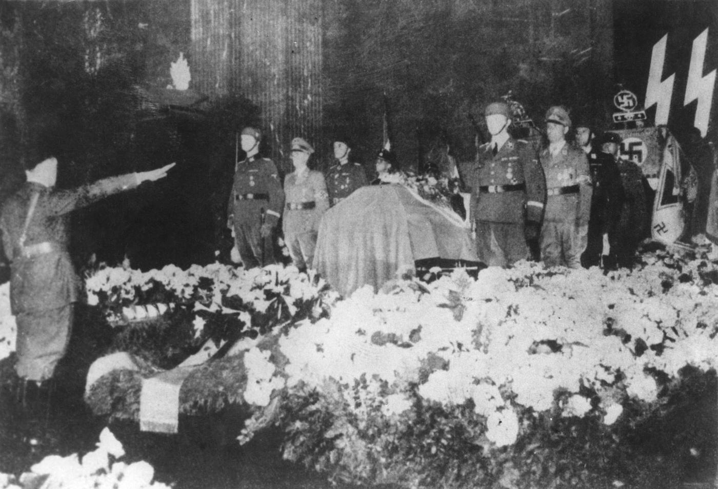 Hitler salutes the coffin of Reinhard Heydrich in the New Reich Chancellery, Berlin, June 1942.