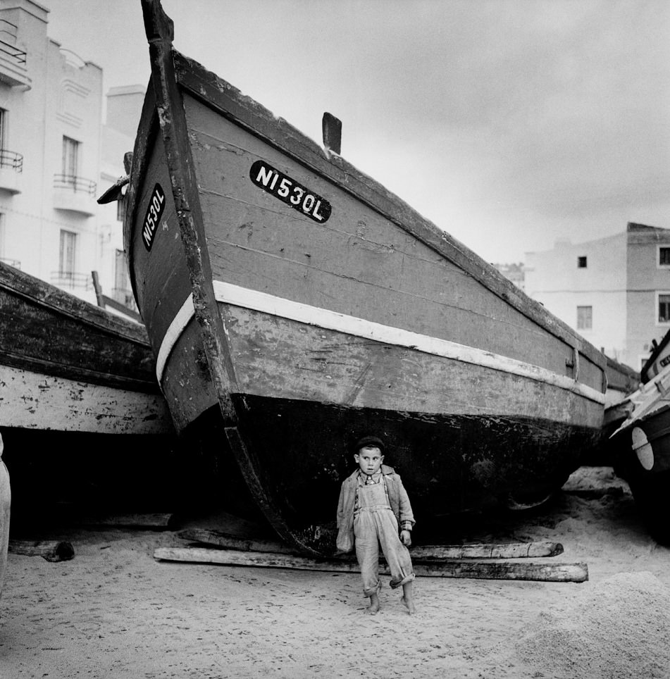 Boy With Toe in the Sand, Portugal, 1956