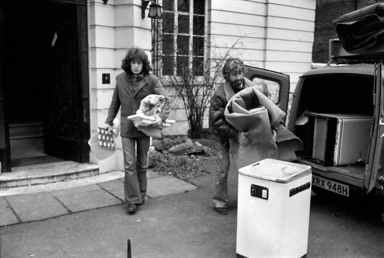 Squatters at Cornwall Terrace overlooking London's River, including a kitchen sink, 1970s.