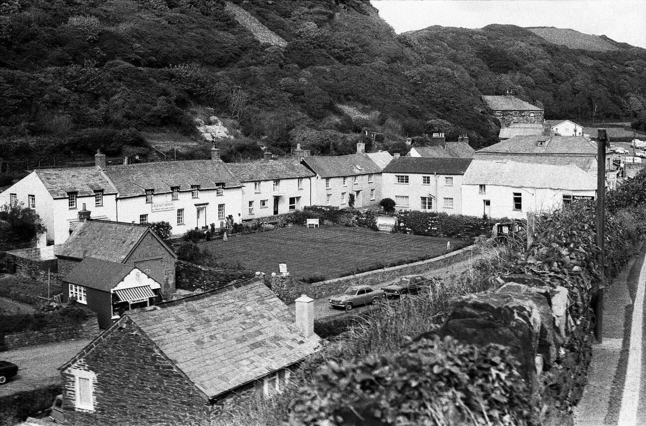 Cottages in Boscastle, including 'Presents and Pottery' shop and 'Valency House' house, June 1975.