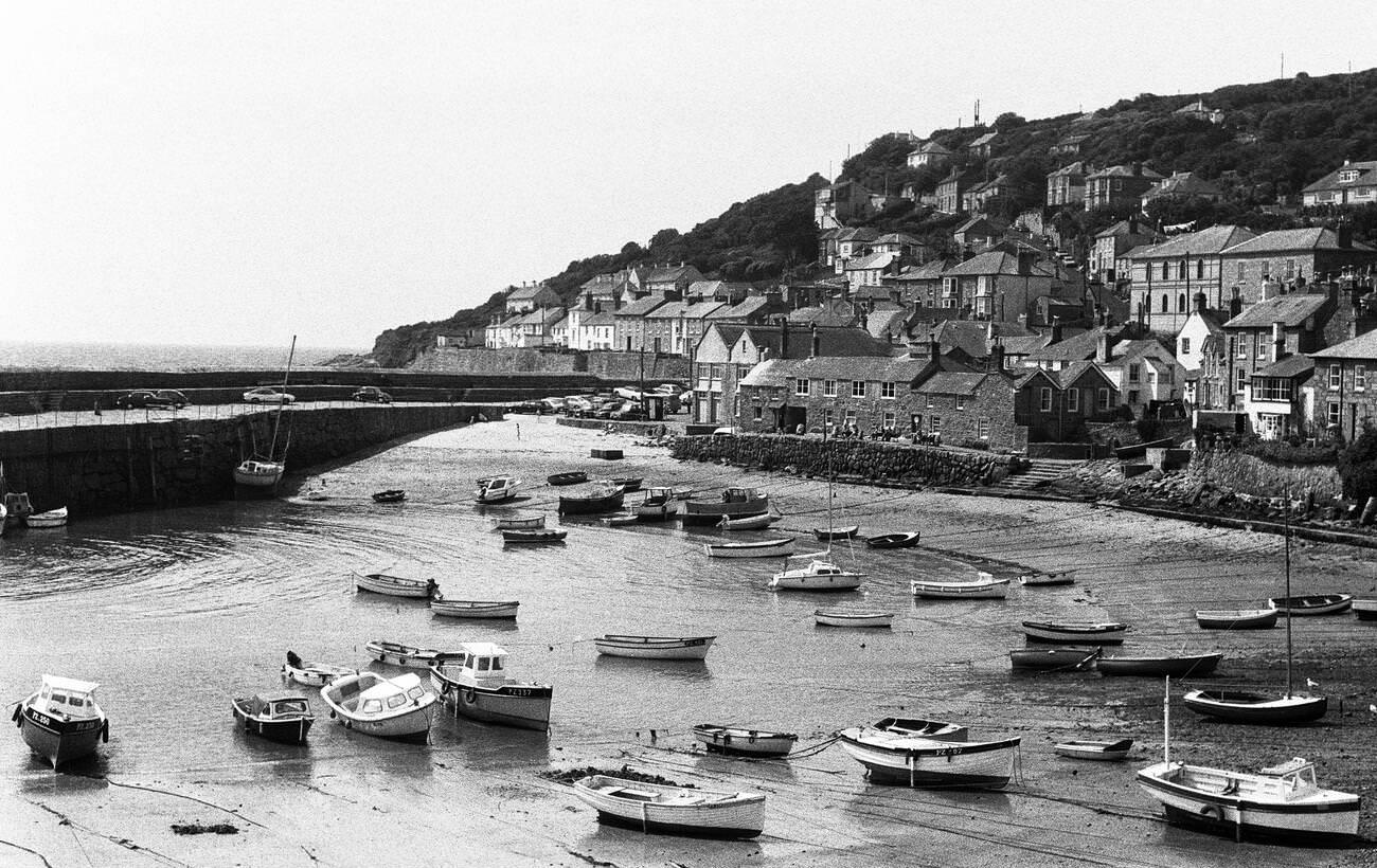 Mousehole Harbour, fishing port in Cornwall, June 1975.