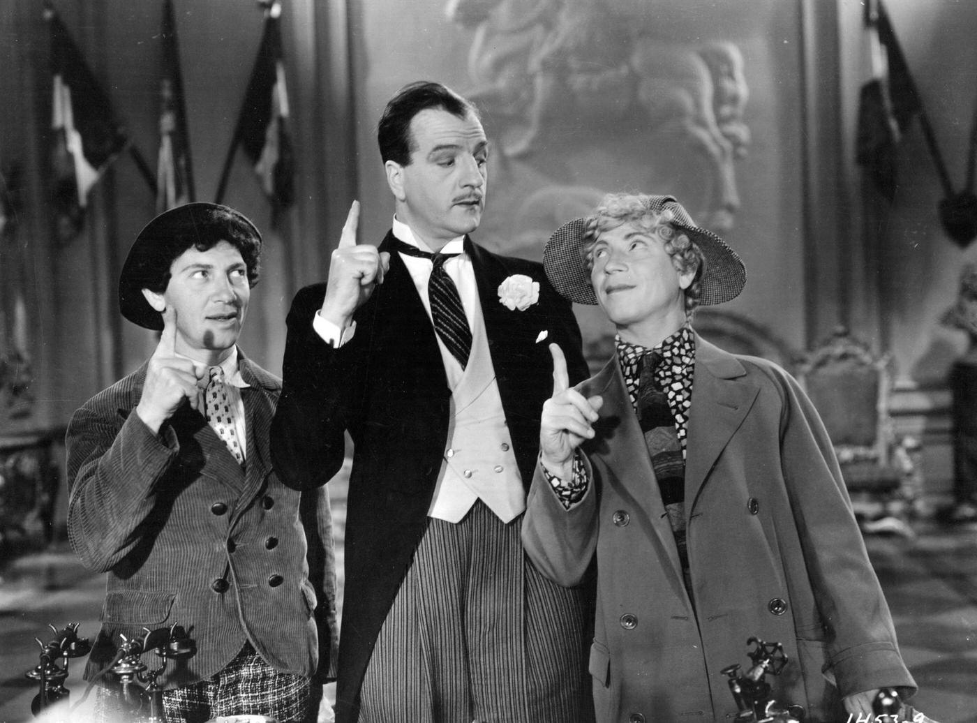 Chico Marx, Louis Calhern, and Harpo Marx star in Duck Soup (1933).
