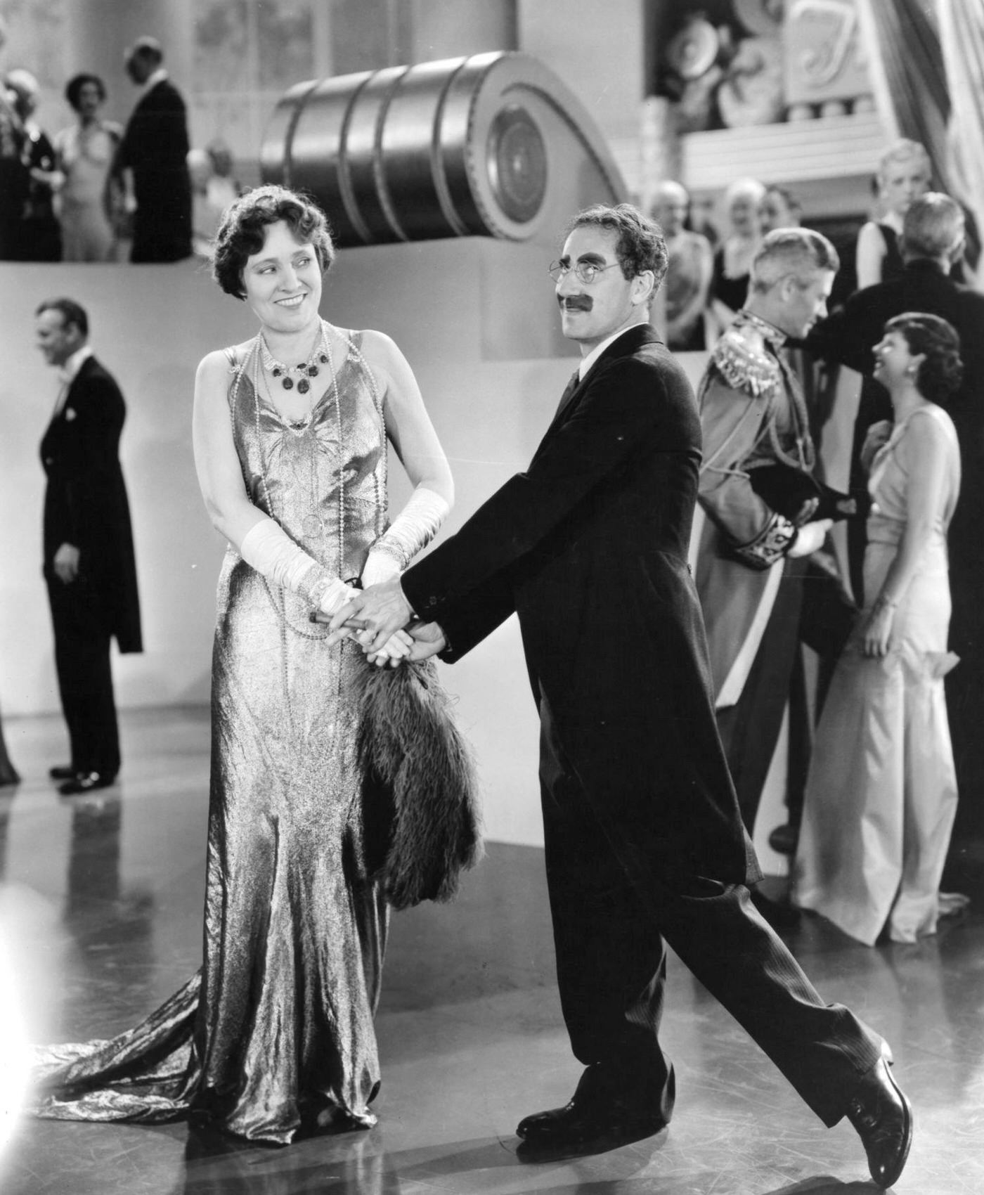 Margaret Dumont dances with Groucho Marx in Duck Soup (1933).