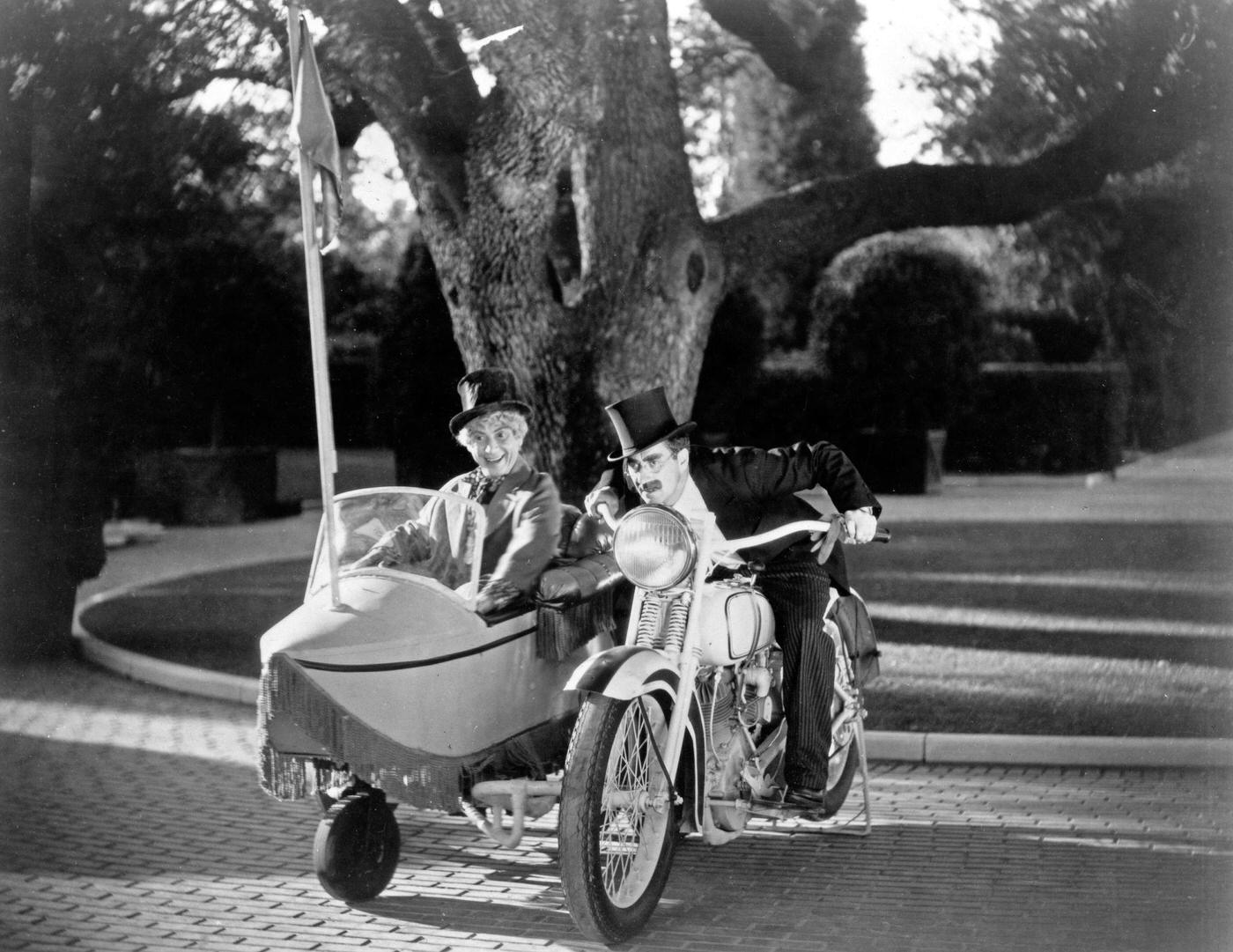 Harpo and Groucho Marx in the film Duck Soup (1933)