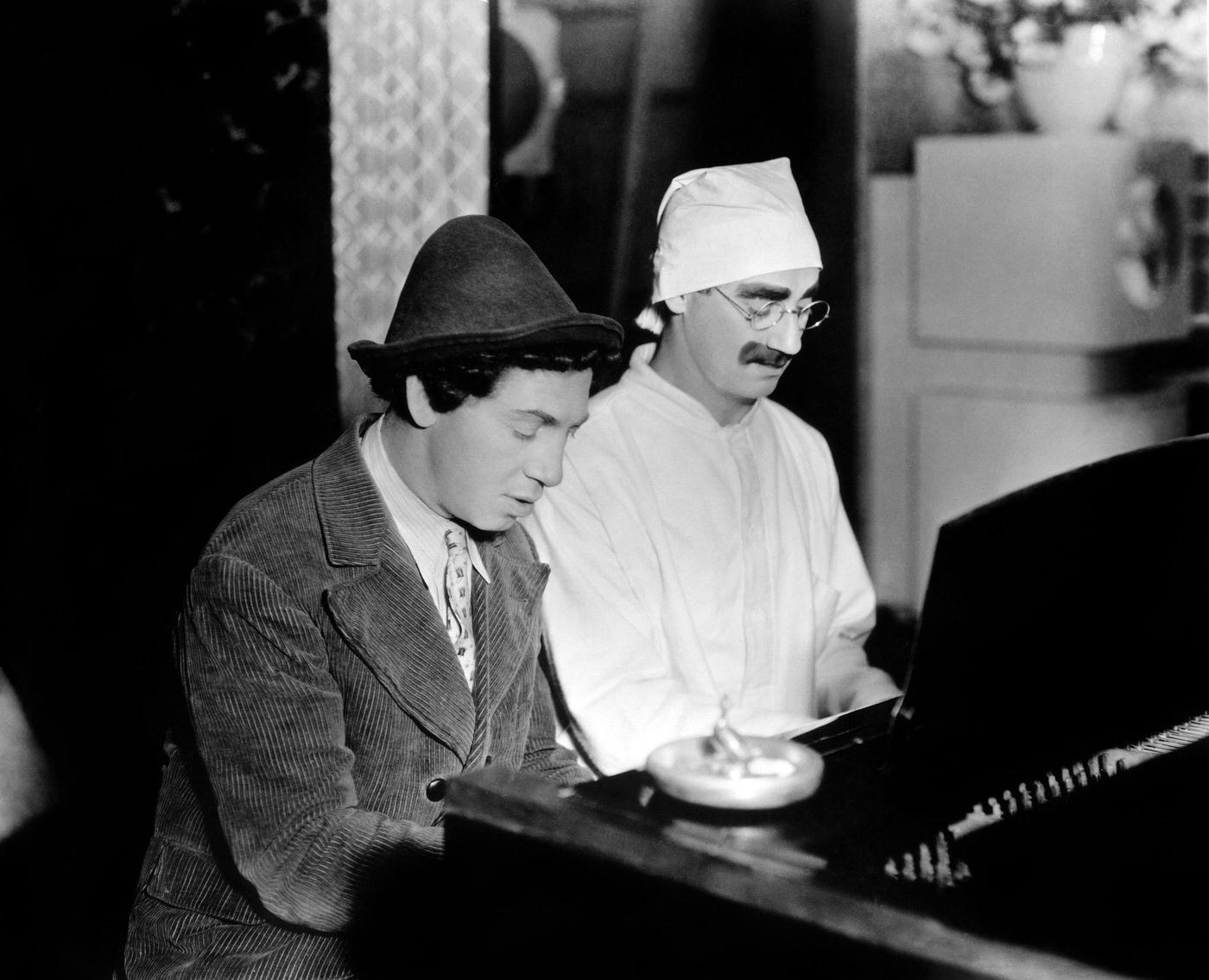 Chico and Groucho Marx play a piano duet in Duck Soup.