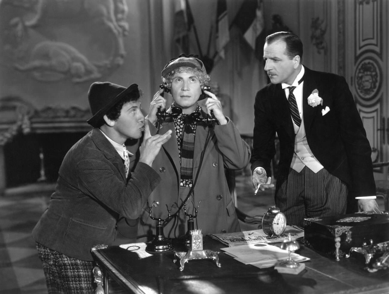 Chico Marx, Harpo Marx, and Louis Calhern in Duck Soup (1933).