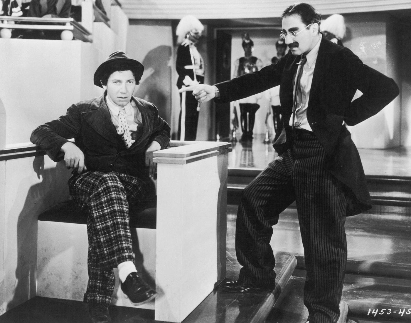 Groucho Marx and Chico Marx as Rufus T. Firefly and Chicolini in Duck Soup (1933).