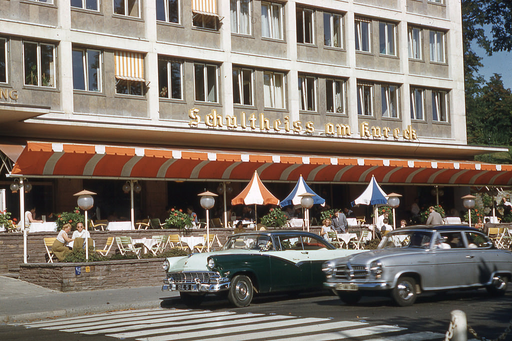 Schultheiss am Kureck in Wiesbaden with a Borgward Isabella Sedan and a Ford Fairlane, 1957