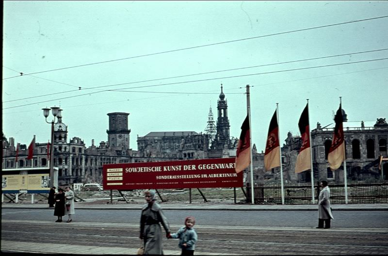 Banner on a site clearly still damaged by the war, advertising a 'Contemporary Soviet Art' exhibition, Dresden
