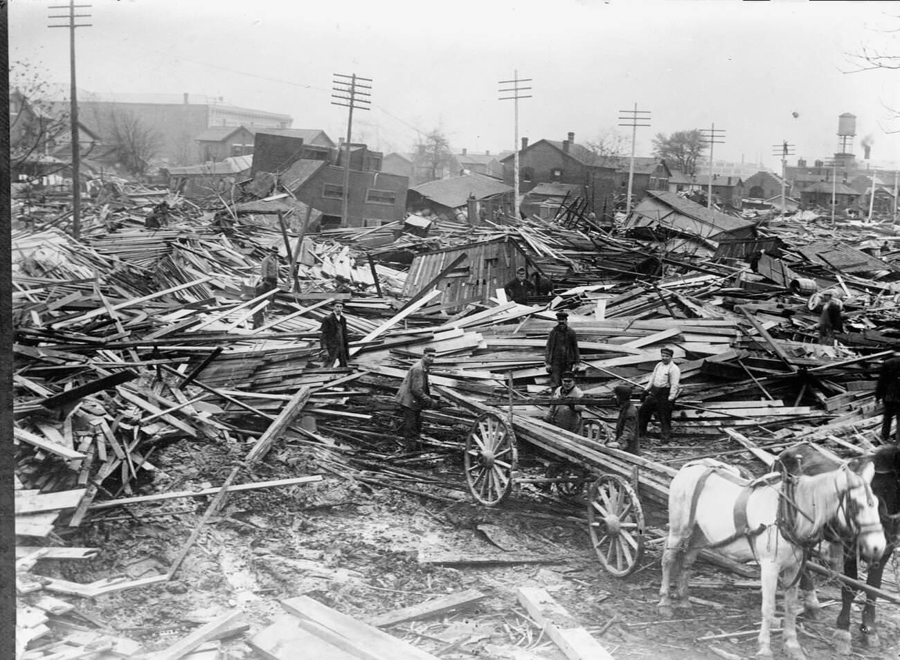 Flood scenes in Dayton, Ohio, 1913. Collapsed timber buildings.