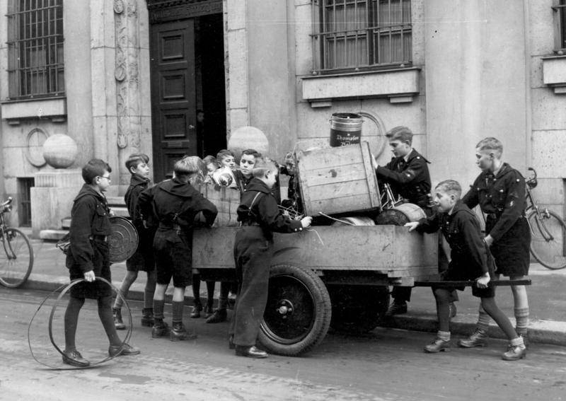 Hitler Youth members collecting scrap metal, 1930s.