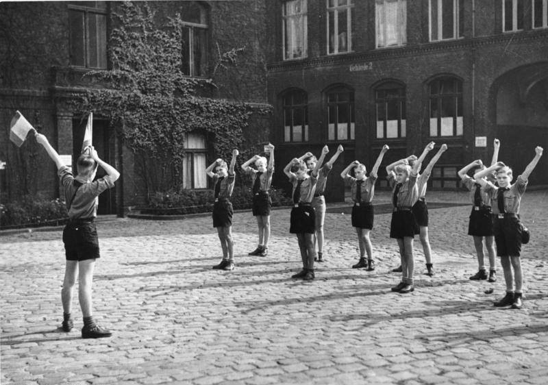 Hitler Youth members learning signal flags, Germany, 1930s.