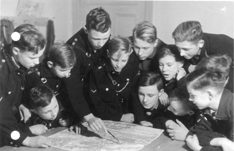 Hitler Youth members learning how to read a map
