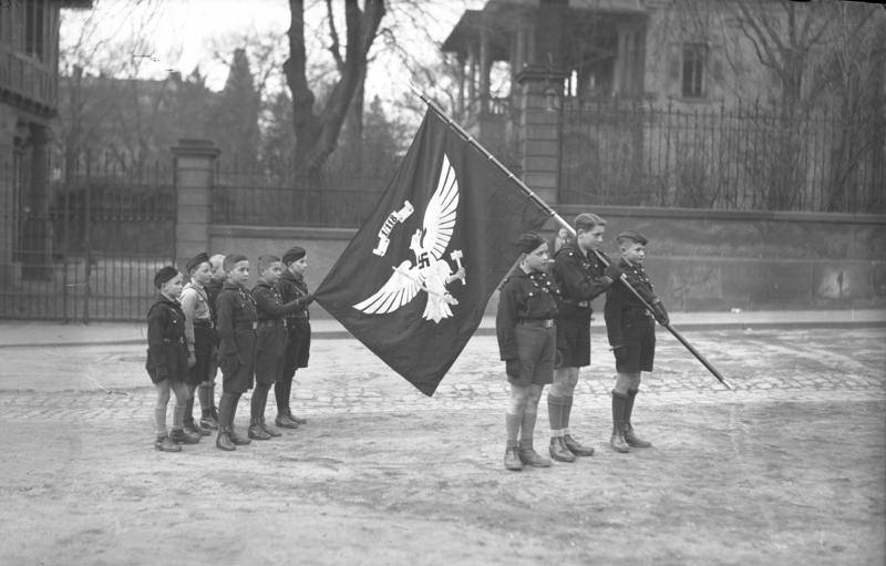Hitler Youth members with a flag, Worms, Germany, 1930s.