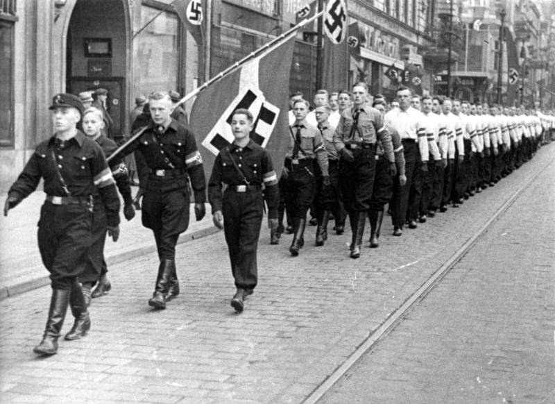 Hitler Youth members marching during the inauguration of Arthur Greiser and Wilhelm Frick, Posen, Germany, Oct 1939.